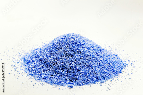 blue Fluorescent pigments, made up of a polymeric matrix, resins of different types such as polyester, alkyd, formaldehyde which are fused with organic dyes. photo