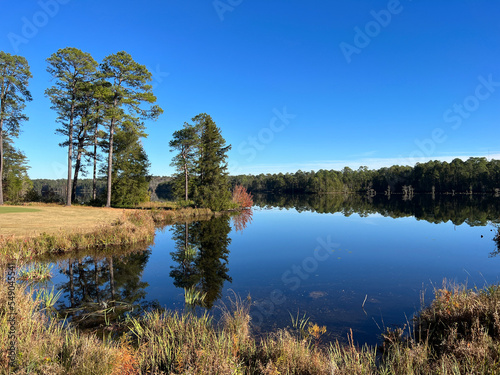 A lakeside view of the golf course at Cheraw State Park, South Carolina, USA.