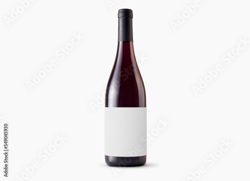 Red wine bottle with blank label on white background. Easily apply your custom design on the label.