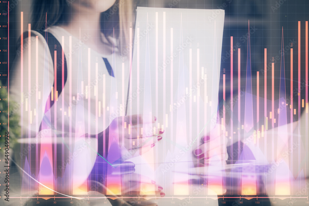 Double exposure of hands making notes with forex chart huds. Stock market concept. Double exposure of hands making notes with forex chart huds. Stock market concept.