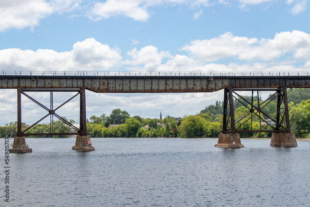 Fototapeta premium Old steel bridge over a river