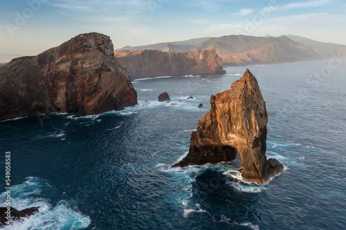 Ponta de Sao Lourenco, Madeira,Portugal. Beautiful scenic mountain view of green landscape,cliffs and Atlantic Ocean. Hiking active day fresh summer scene. Travel holiday background photo