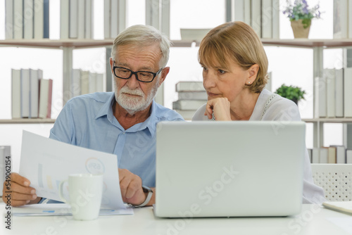 Mature married couple plan money invest for retired