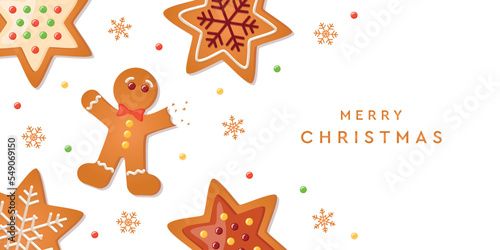 christmas greeting card with gingerbread cookies decoration on blue background