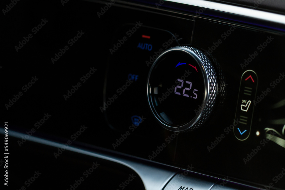 Digital control panel car air conditioner dashboard. Modern car interior conditioning buttons inside a car close up view. Digital control panel car air conditioner dashboard. Modern car interior conditioning buttons inside a car close up view.