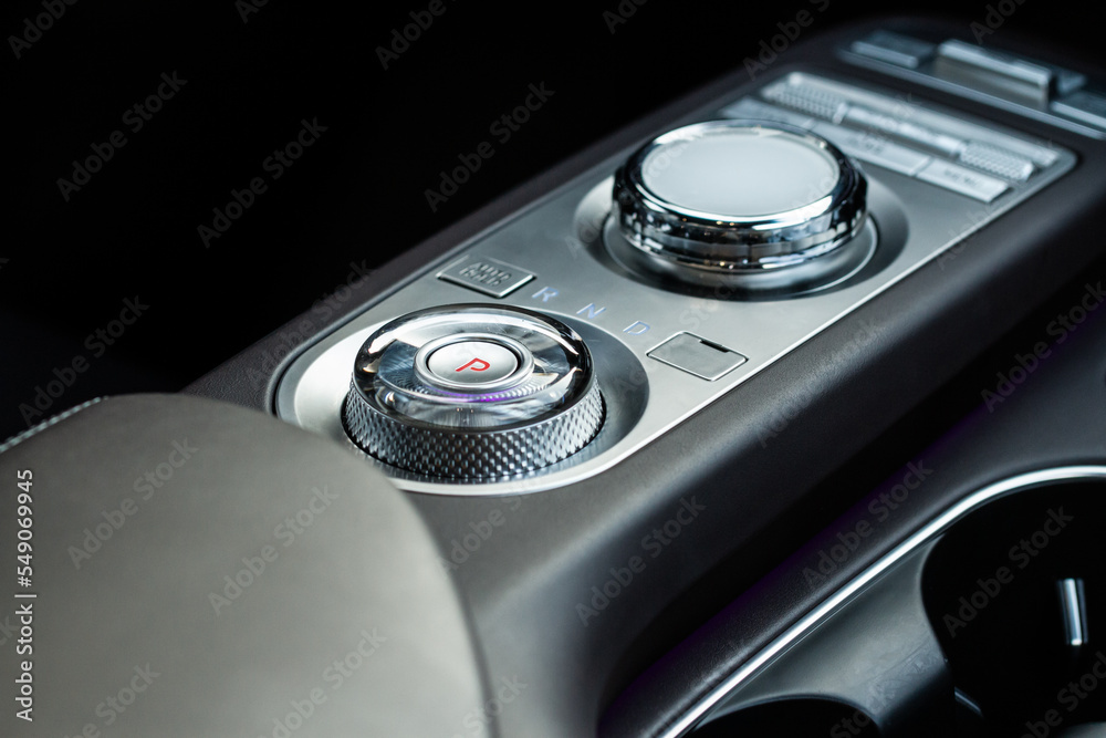 Modern car automatic gearbox. Gearbox control buttons. Gear selector close up..