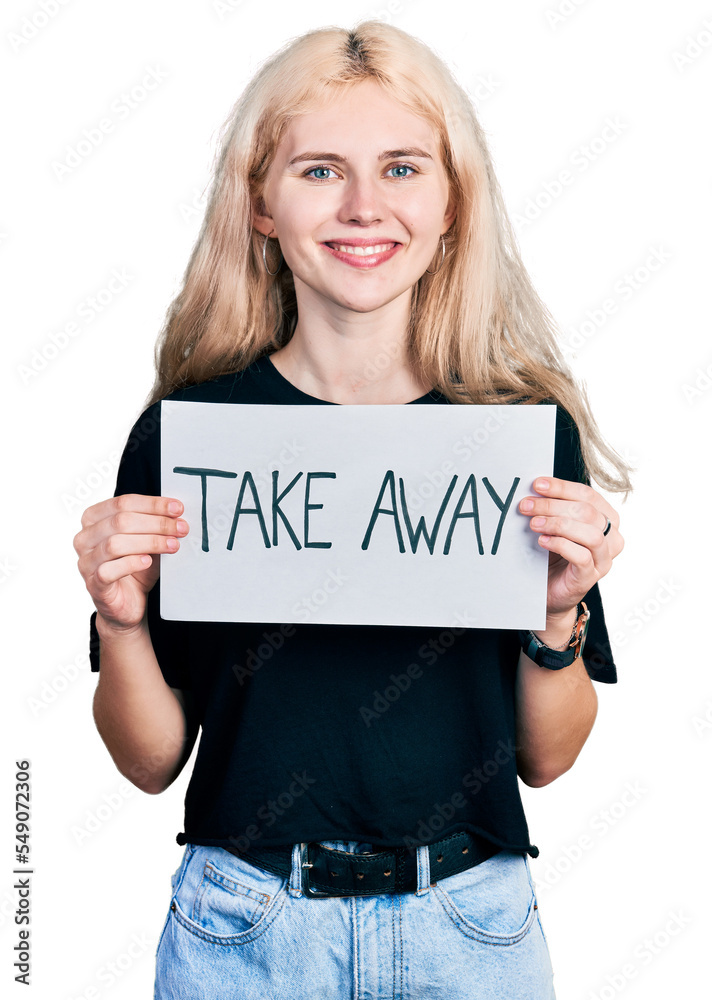Young caucasian woman holding banner with take away message smiling with a happy and cool smile on face. showing teeth. Young caucasian woman holding banner with take away message smiling with a happy and cool smile on face. showing teeth.