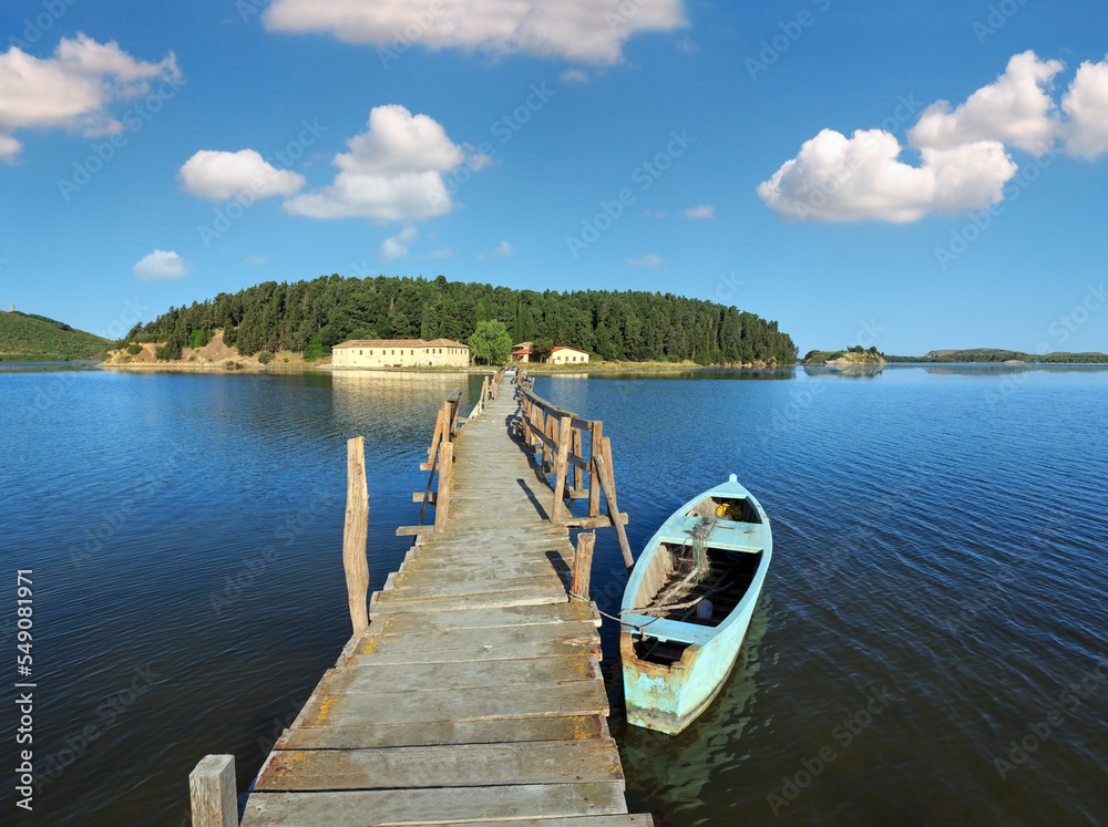 Wooden ruined bridge to isolated Monastery of Saint Mary on Zvernec island (Narta Lagoon, Vlore, Albania). Wooden ruined bridge to isolated Monastery of Saint Mary on Zvernec island (Narta Lagoon, Vlore, Albania).