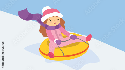 girl slides down the hill on an inflatable bun