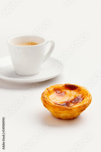 Traditional Portuguese egg tart dessert Pasteis Pastel de nata or Pasteis de Belem with coffee over white background