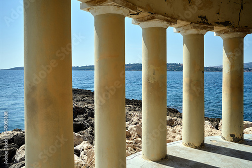 Colonnade of the historic St. Theodora lighthouse on the island of Kefalonia