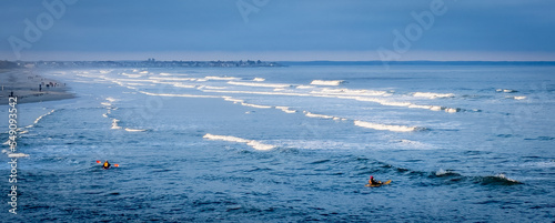 Kayakers in ocean at Ogunquit beach in Maine