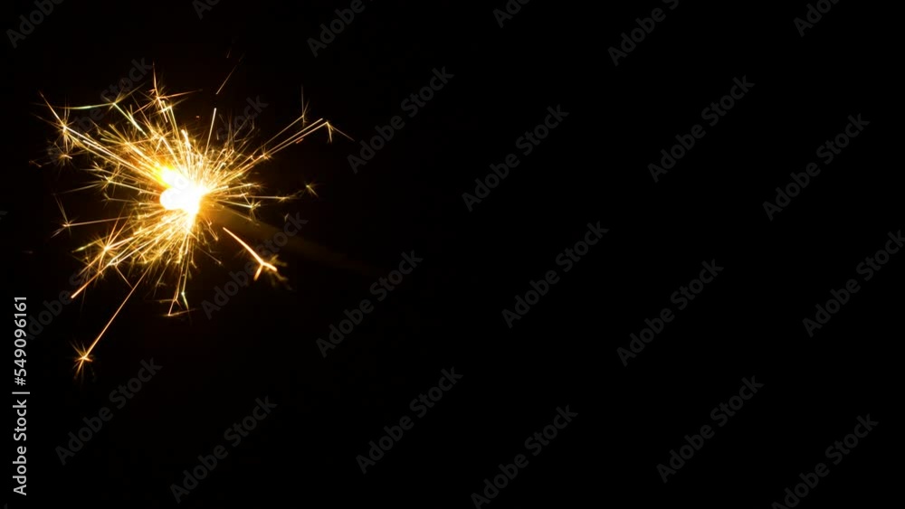 Bengal fire on a black background close-up.