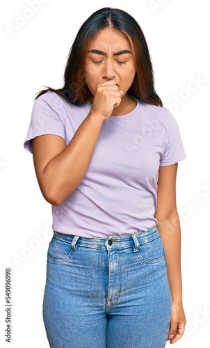 Young latin woman wearing casual clothes feeling unwell and coughing as symptom for cold or bronchitis. health care concept.