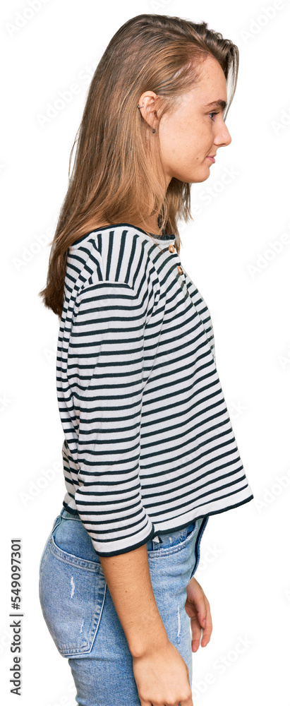 Beautiful blonde woman wearing casual clothes looking to side, relax profile pose with natural face with confident smile. Beautiful blonde woman wearing casual clothes looking to side, relax profile pose with natural face with confident smile.