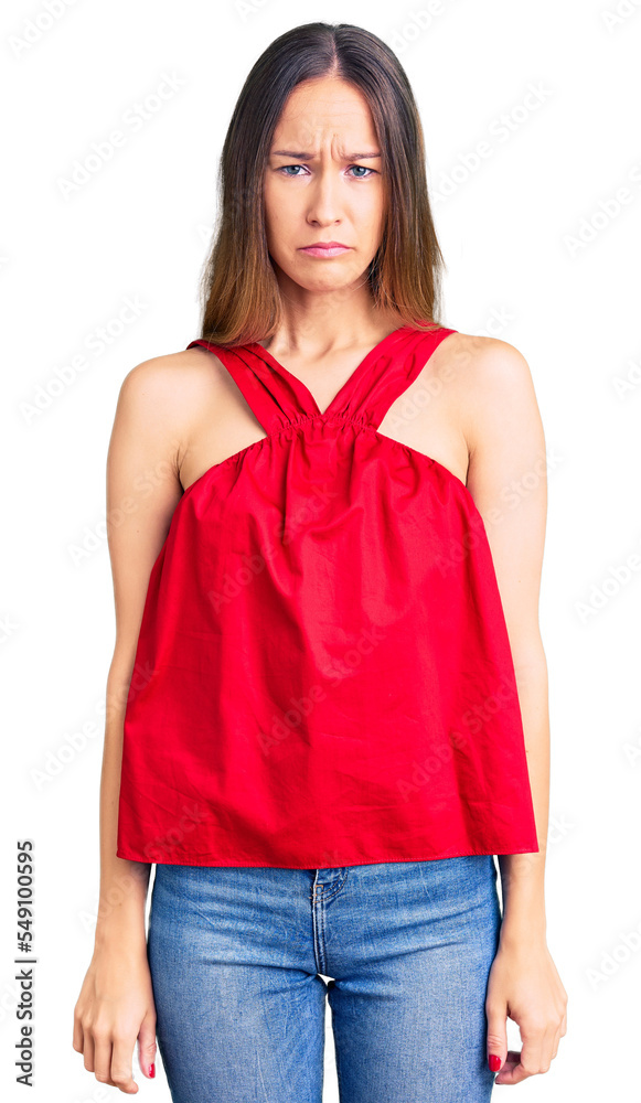 Beautiful brunette young woman wearing casual clothes depressed and worry for distress, crying angry and afraid. sad expression. Beautiful brunette young woman wearing casual clothes depressed and worry for distress, crying angry and afraid. sad expression.