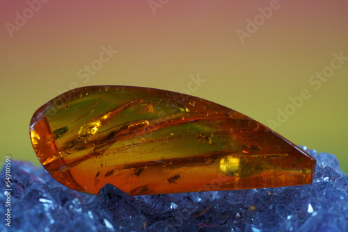 Amber is made of yellow transparent fossil resin photo