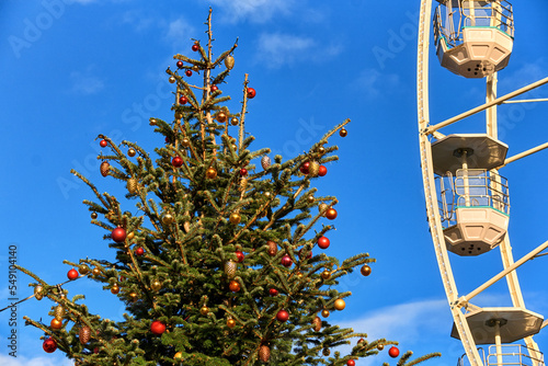 big weel and christmas tree with decorations in geneva , switzerland photo