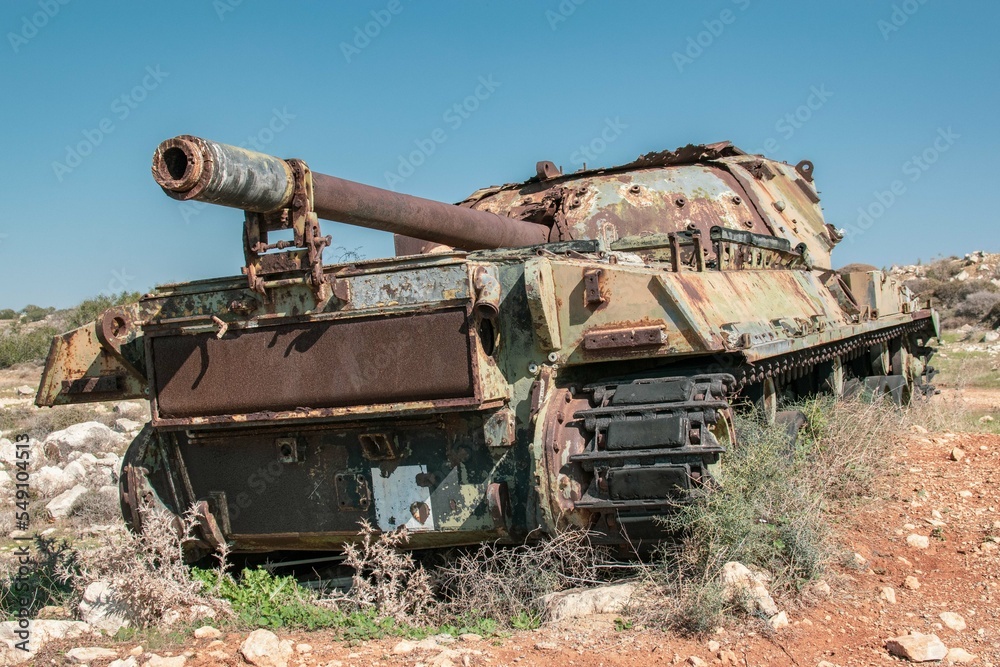 Old, destroyed tank in Cyprus. Military compound on the coast. 