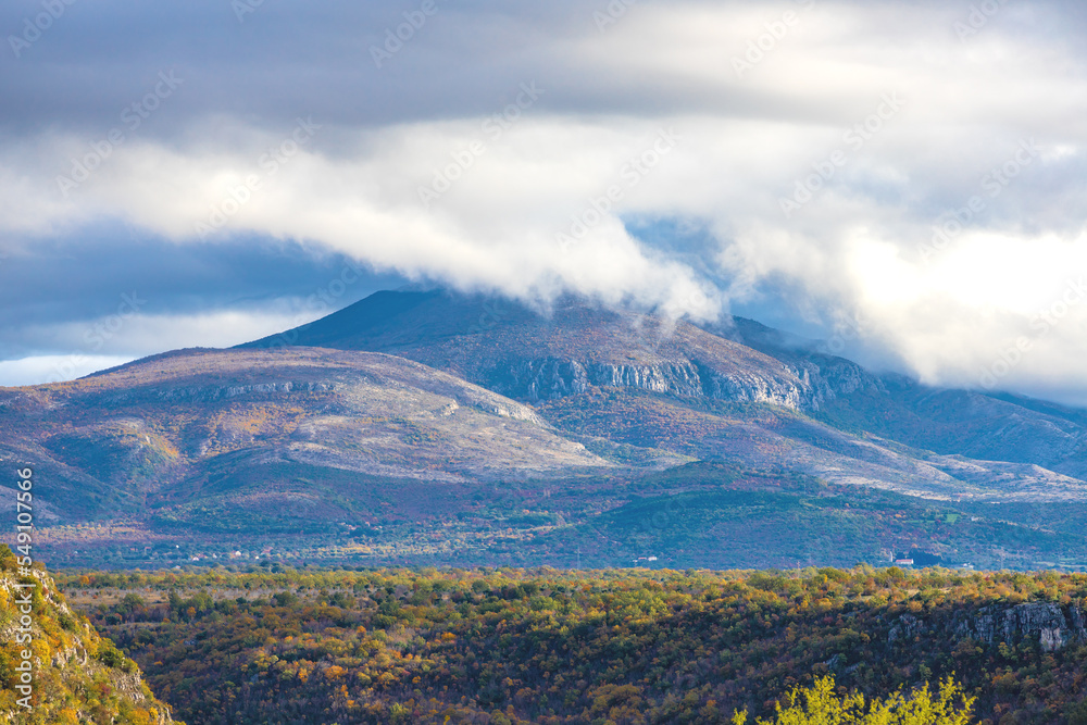 Natural landscape with high mountains and clouds in Croatia Natural landscape with high mountains and clouds in Croatia