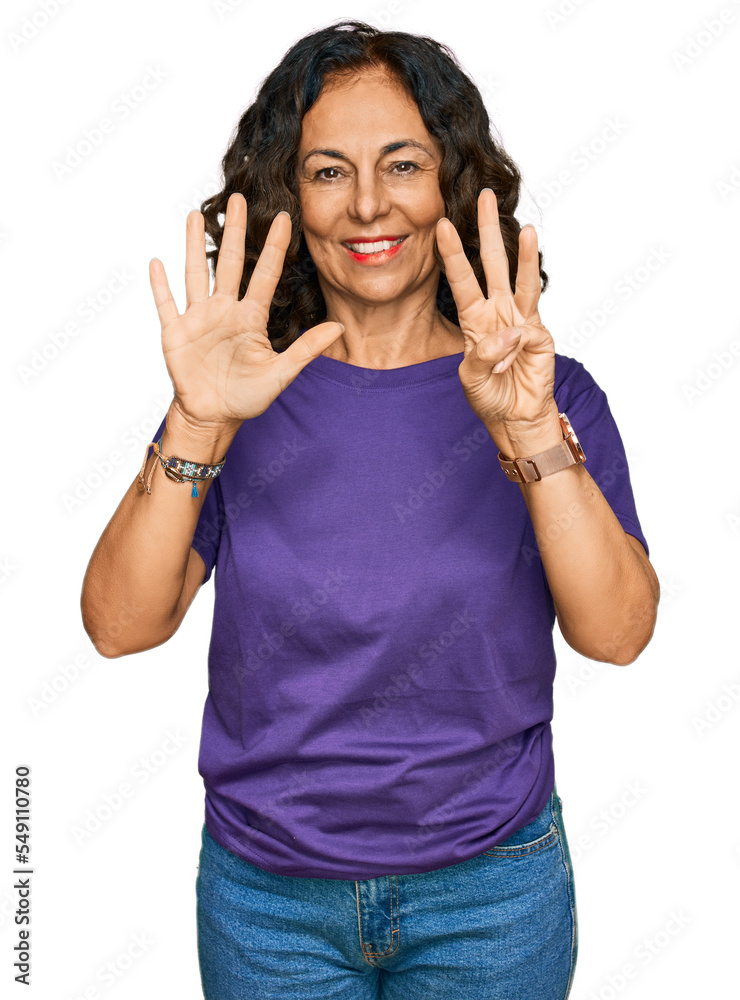 Middle age hispanic woman wearing casual clothes showing and pointing up with fingers number eight while smiling confident and happy. Middle age hispanic woman wearing casual clothes showing and pointing up with fingers number eight while smiling confident and happy.