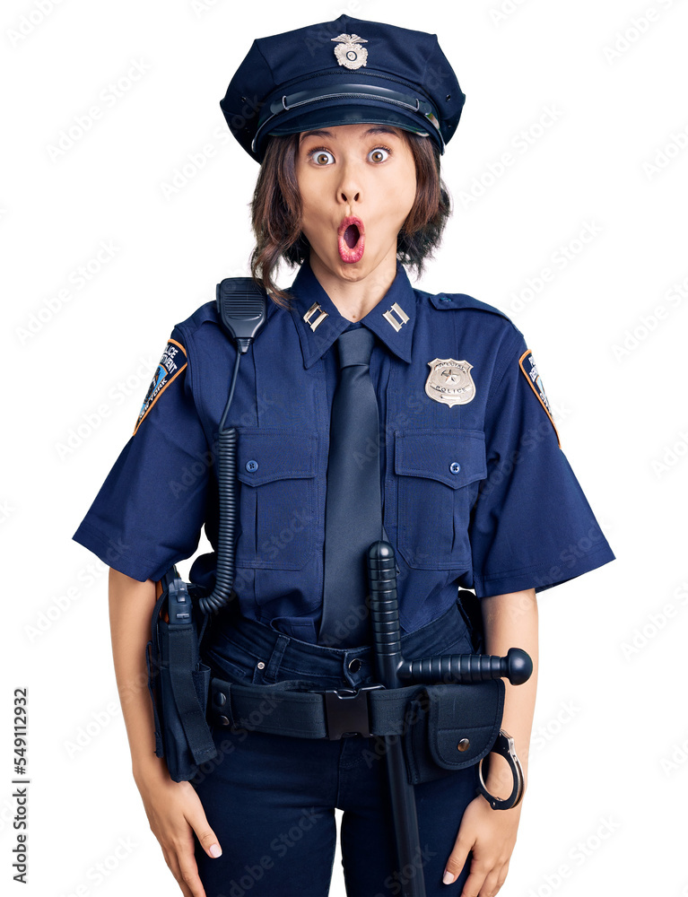 Young beautiful girl wearing police uniform afraid and shocked with surprise expression, fear and excited face. Young beautiful girl wearing police uniform afraid and shocked with surprise expression, fear and excited face.