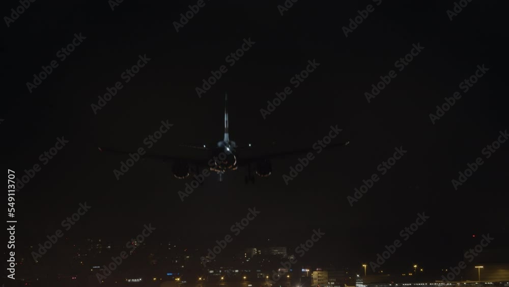 Landing airplane at night Landing airplane at night