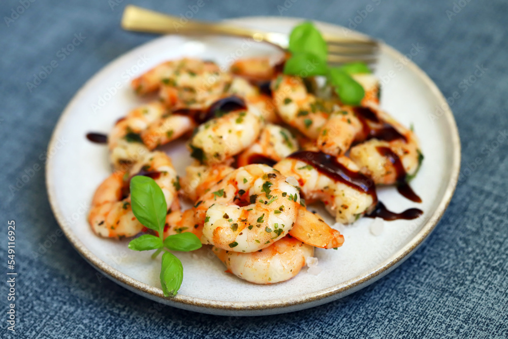 Asian style cooked shrimp with hot spices on a plate. Asian style cooked shrimp with hot spices on a plate.