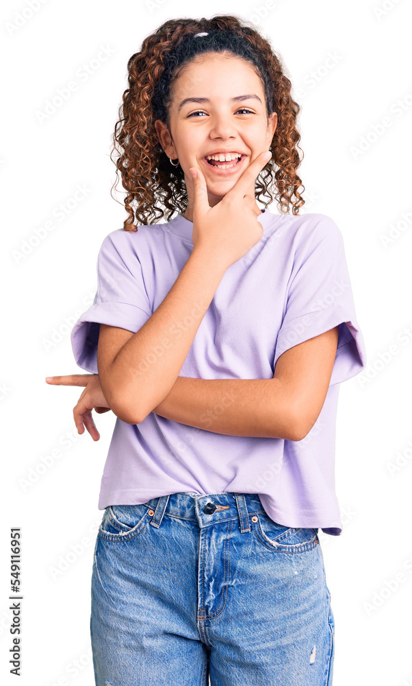 Beautiful kid girl with curly hair wearing casual clothes looking confident at the camera smiling with crossed arms and hand raised on chin. thinking positive.