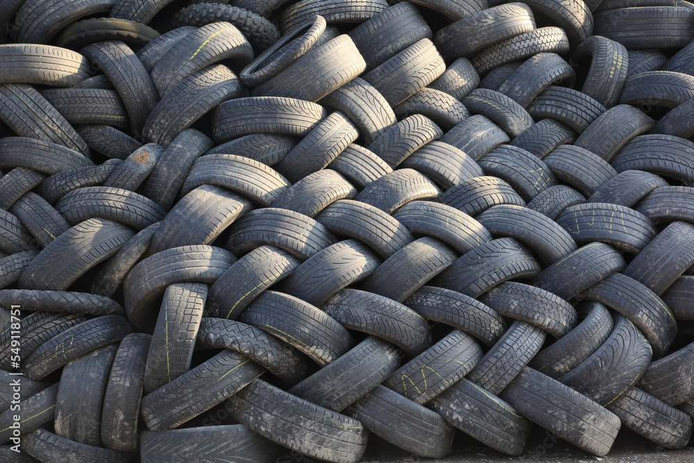 Large waste tyre pile ready for tyre recycling.