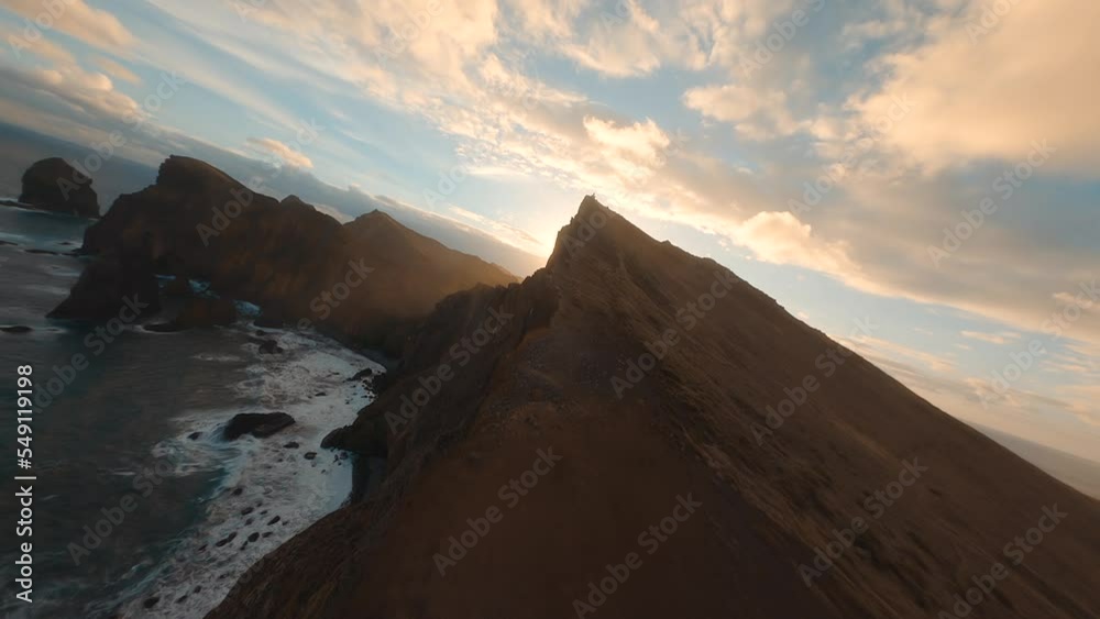 Drone flying over the sea, rocks, mountain and cliff on the island of madeira in Portugal Drone flying over the sea, rocks, mountain and cliff on the island of madeira in Portugal