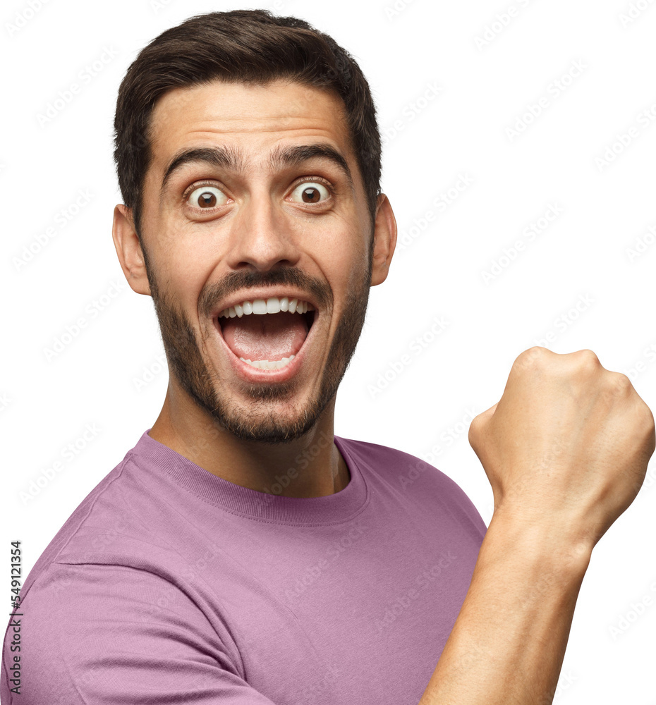 Passionate soccer fan. Young man in casual blue t-shirt screaming while his team win, raised fist in victory gesture, isolated on gray background Passionate soccer fan. Young man in casual blue t-shirt screaming while his team win, raised fist in victory gesture, isolated on gray background