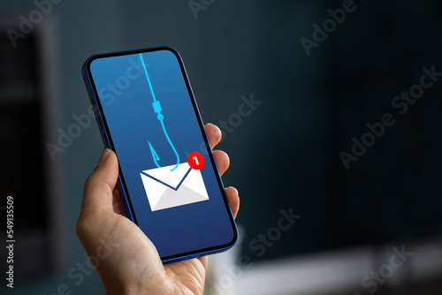 Phishing bait alert concept on a smartphone screen photo