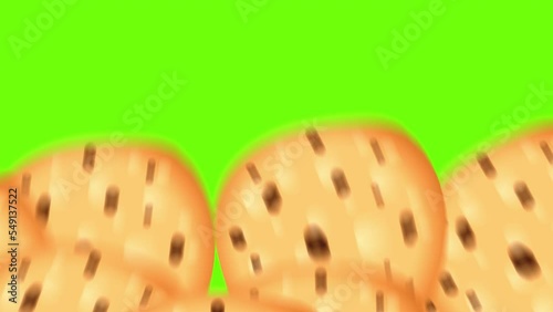 Cookies with chocolate chip filling animation on a green screen. Video transition with sweets. Stock video cookies in 4k with alpha channel.