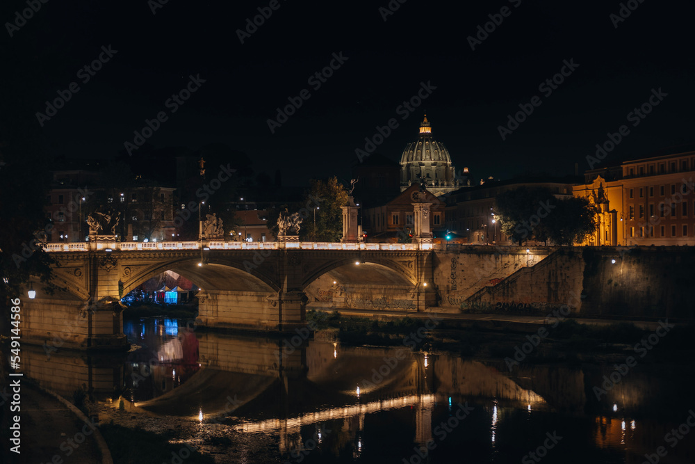city bridge at night in Rome