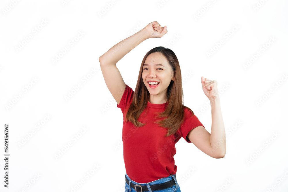 Pretty Asian people wearing red t-shirt for a woman isolated on white background. Successful young woman achieve goal or prize, raising hands up and scream yes with joy and excitement. Pretty Asian people wearing red t-shirt for a woman isolated on white background. Successful young woman achieve goal or prize, raising hands up and scream yes with joy and excitement.