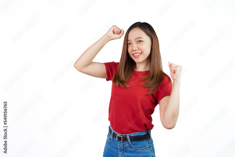 Pretty Asian people wearing red t-shirt for a woman isolated on white background. Successful young woman achieve goal or prize, raising hands up and scream yes with joy and excitement. Pretty Asian people wearing red t-shirt for a woman isolated on white background. Successful young woman achieve goal or prize, raising hands up and scream yes with joy and excitement.