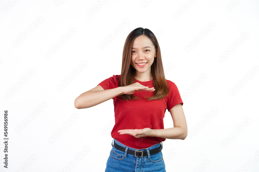 Pretend to hold somethings, Pretty Asian people wearing red t-shirt for a woman isolated on white background. Pretend to hold somethings, Pretty Asian people wearing red t-shirt for a woman isolated on white background.