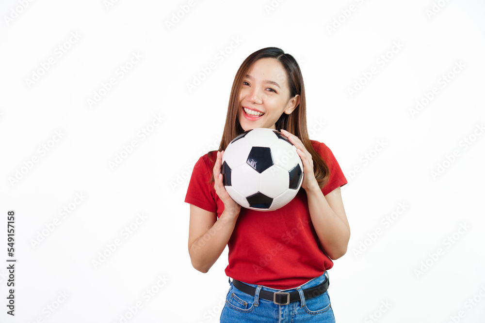 Holding football, Pretty asian women England soccer fans celebrating over white background isolated. Sports fan isolated young woman.