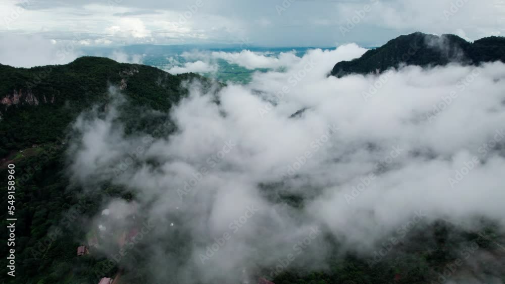 mountain ridge and clouds in rural jungle bush forest. Ban Phahee, Chiang Rai Province, Thailand mountain ridge and clouds in rural jungle bush forest. Ban Phahee, Chiang Rai Province, Thailand