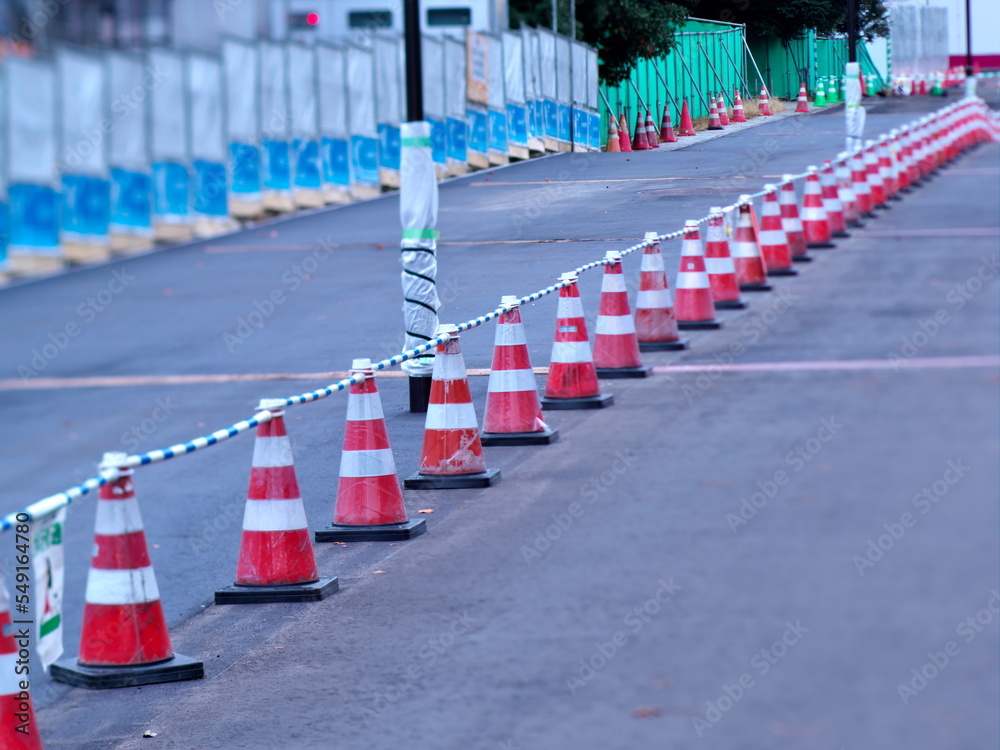 Tokyo,Japan - November 26, 2022: Traffic cones or Safety cones for surfacing road maintenance,
