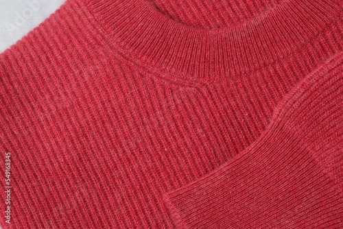 Knitwear. English knitted ribbed sweater. The jumper is red. Structural elements. The collar is round. Sleeves, cuff. Decorative weaving of threads.