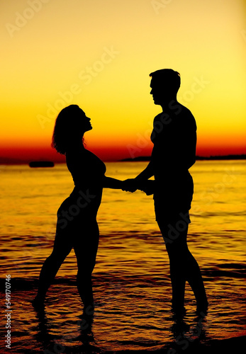 parent and child at the beach