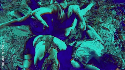 Four women on the floor dance making slow rhythmic movements with their hands and body, in an abstract motion drawing psychedelic collage