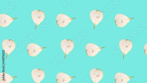Pear slices in seamless loop pattern on a light blue background. Exotic fruits in seamless loop animation. Endless food motion graphic background (ID: 549176525)
