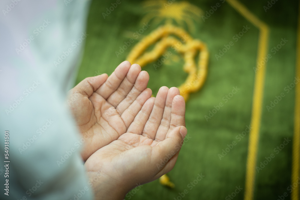 cute little girl hands praying to god on praying mat, girl praying to