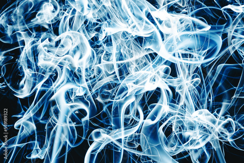 Blue smoke background. Gas flow isolated on black. Gas flow shape effect. Artistic color scent mist background. Magic fog curls. Smoky chaos texture. Steam mist cloud. Magis air fog. photo