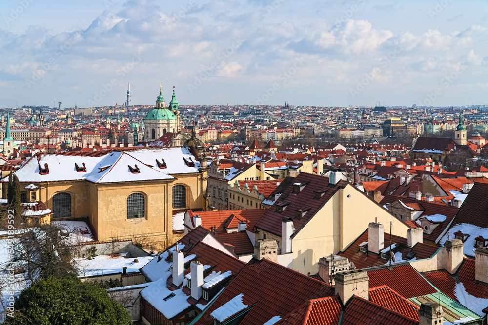 Prague, Czech Republic. Winter Prague with Mala Strana district in the foreground and districts of the right bank of Vltava river in the background. High angle view from the Prague Castle.