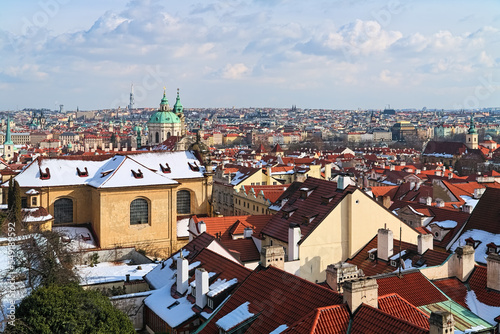 Obraz na płótnie Prague, Czech Republic. Winter Prague with Mala Strana district in the foreground and districts of the right bank of Vltava river in the background. High angle view from the Prague Castle. w salonie