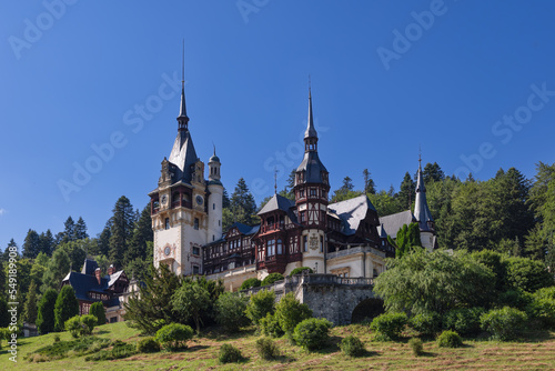 Peles Castle amongst other monuments, surrounded by pretty landscape with gardens built on terraces. It is very impressive through riches it has accumulated, Sinaia, Romania